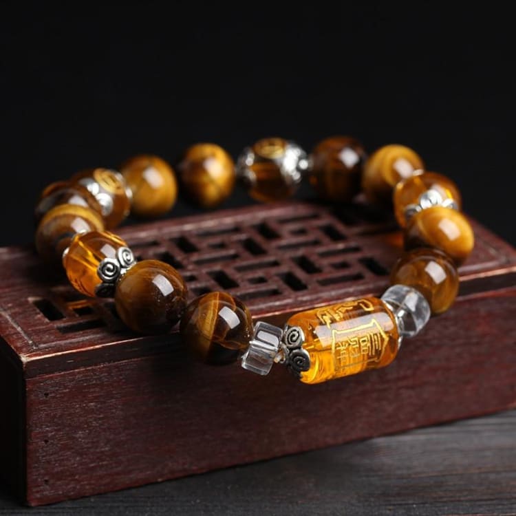 Bracelet de 6 mantras en oeil de tigre - Eclat de Pierre