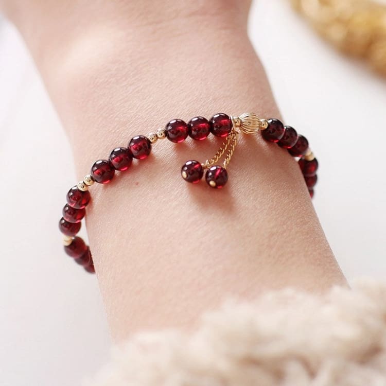 Bracelet de force grenat rouge