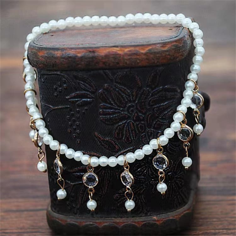 Bracelet de cheville avec perles et pendentifs en cristal