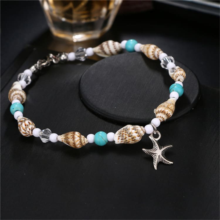 Bracelet de cheville pour femme en forme de coquillage