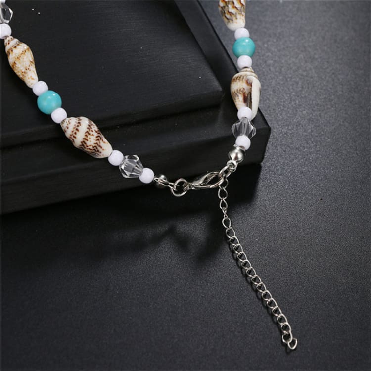 Bracelet de cheville pour femme en forme de coquillage