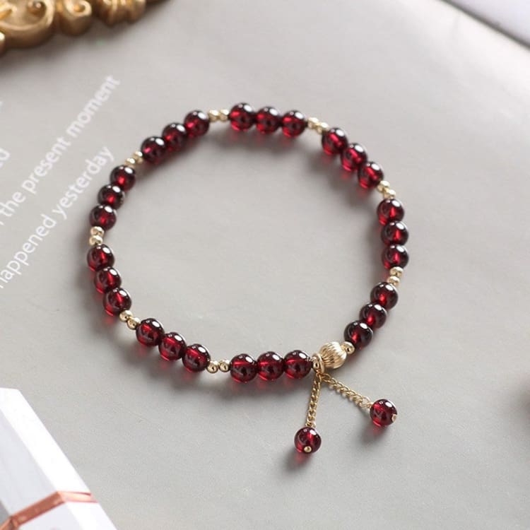 Bracelet de force grenat rouge