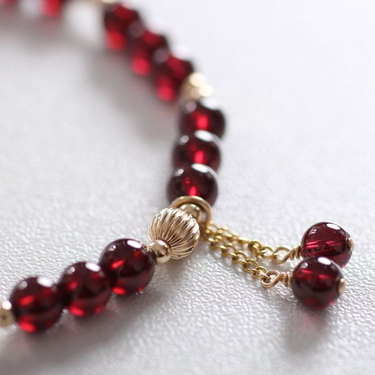 Bracelet de force grenat rouge