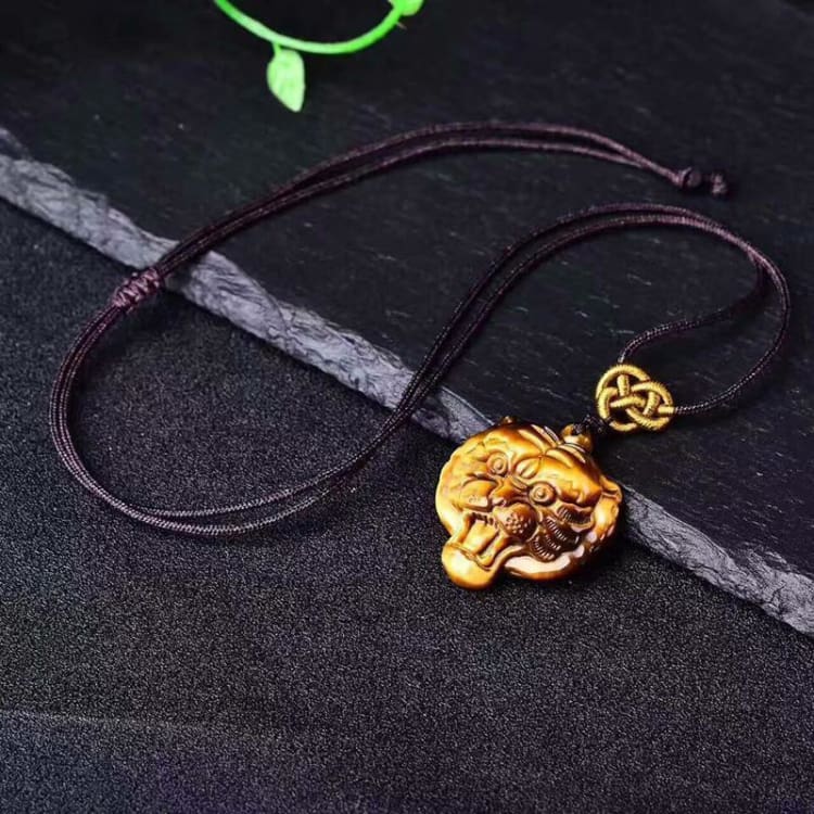 Collier tressé avec pendentif Tigre en Oeil de Tigre